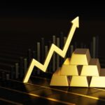 Graf med guldtackor i bakgrunden