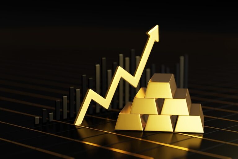 Graf med guldtackor i bakgrunden